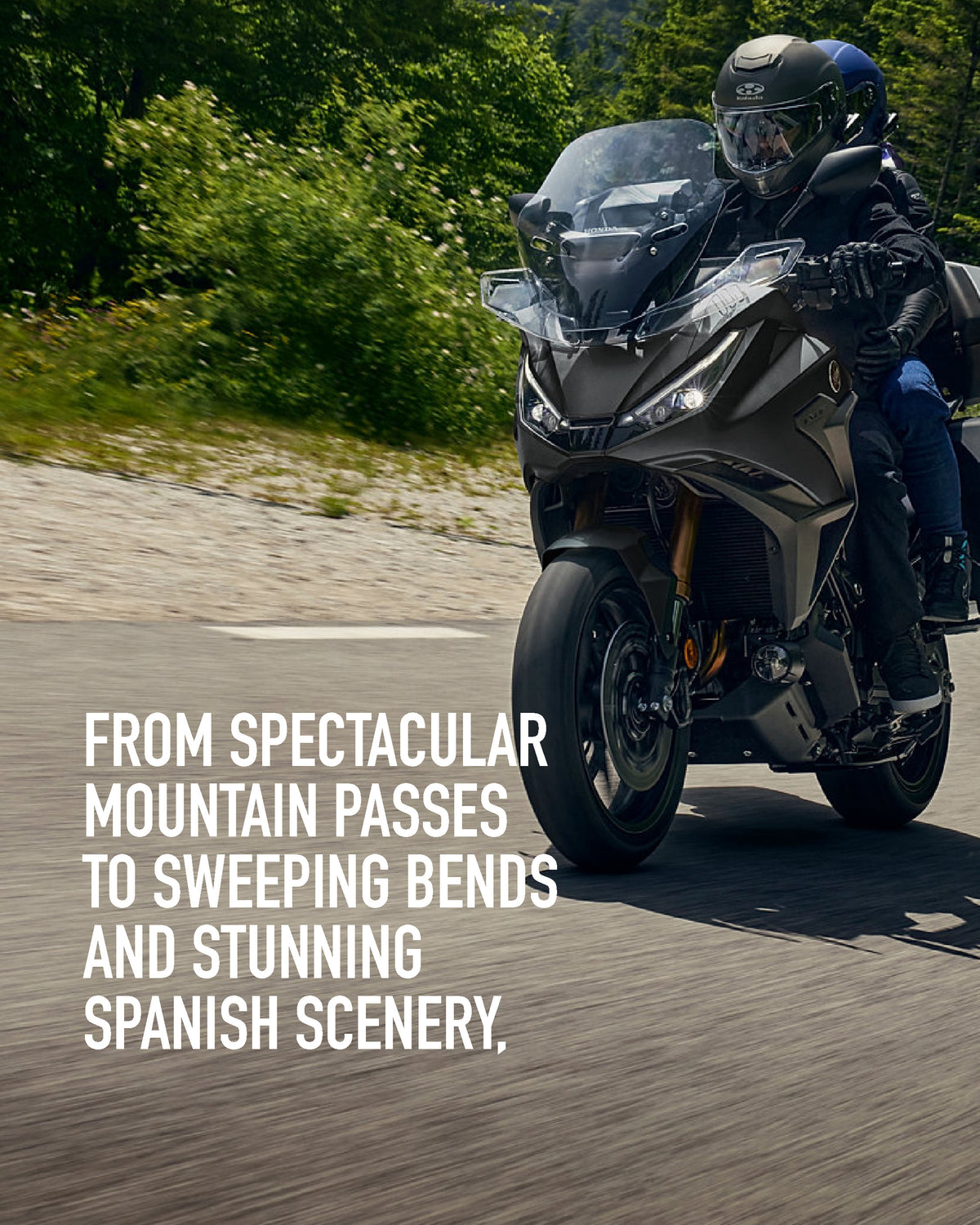 Honda of Bournemouth Spain 2027 motorcycle tour through the Spanish mountains, featuring scenic roads and a touring motorcycle.
